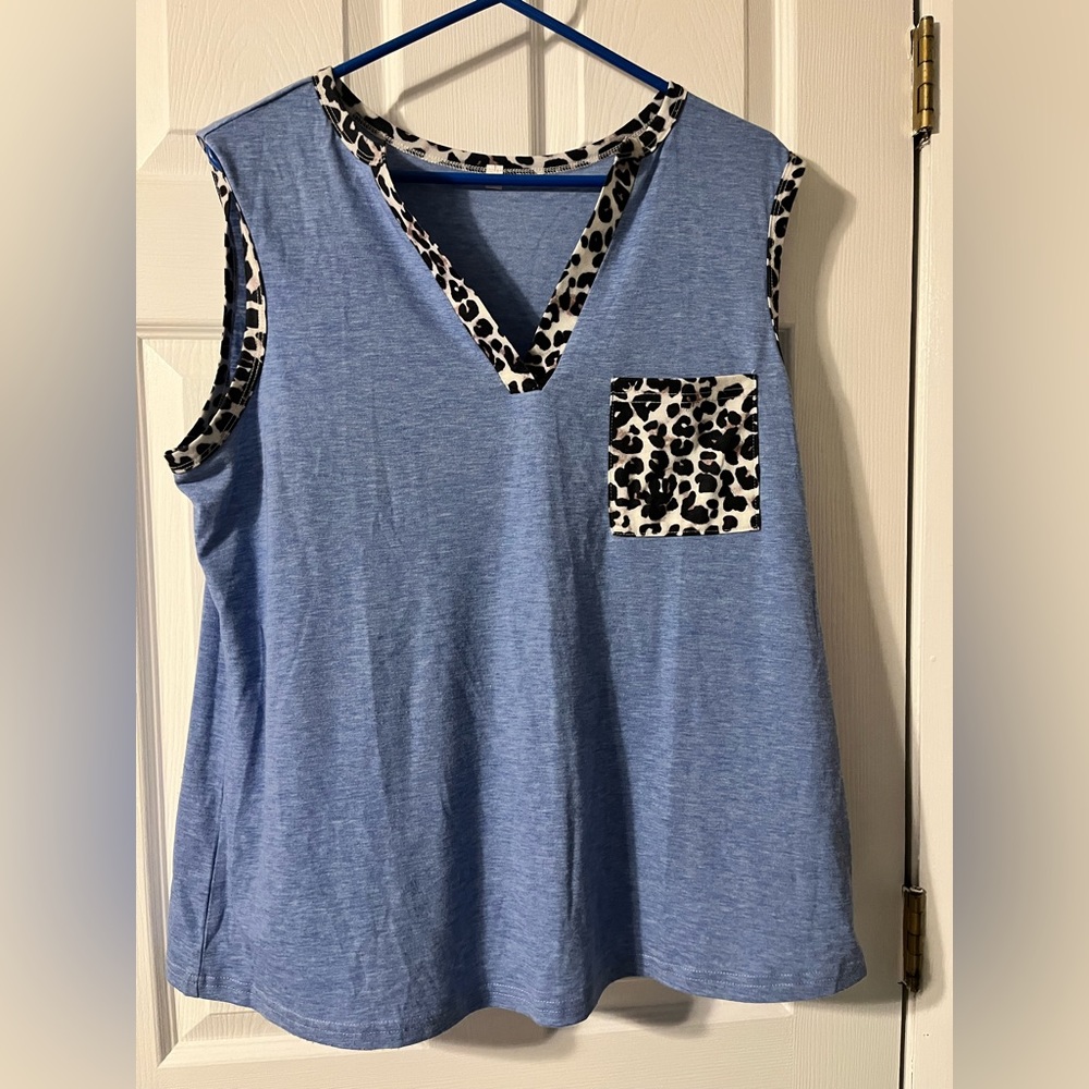 Blue tank with cheetah trim. 2XL